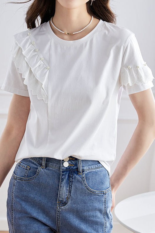 Elegant topp med volanger