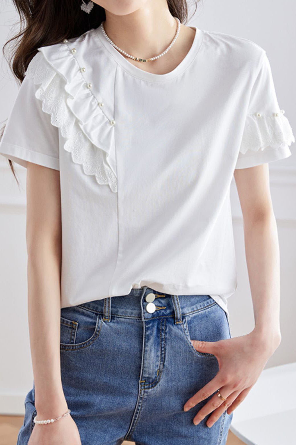 Elegant topp med volanger