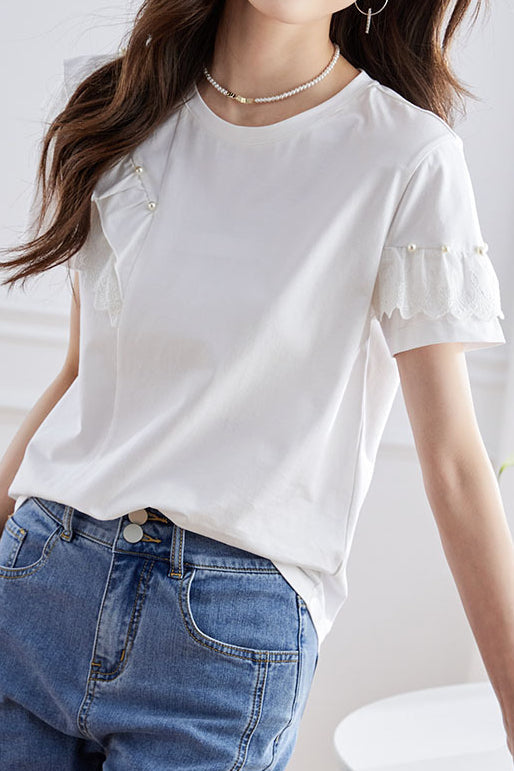 Elegant topp med volanger