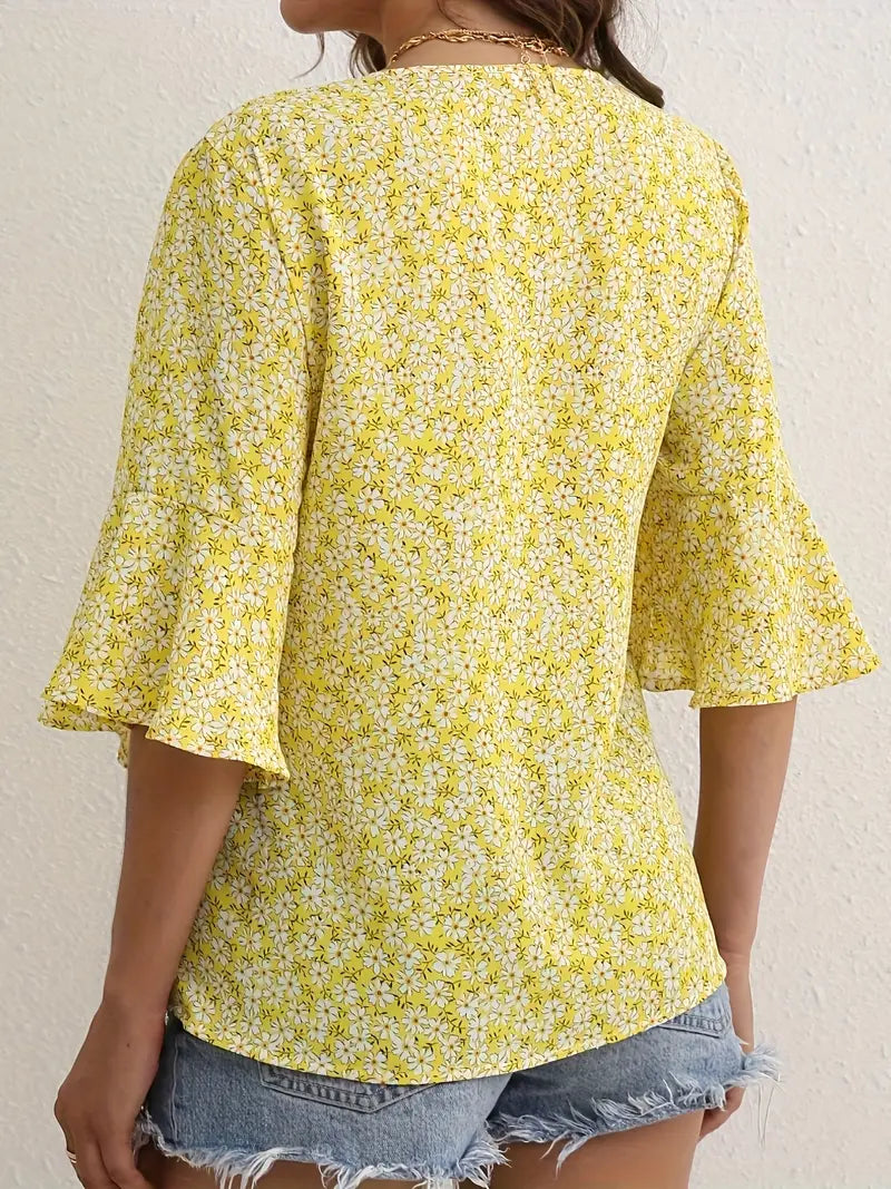 Blommig blus med V-hals