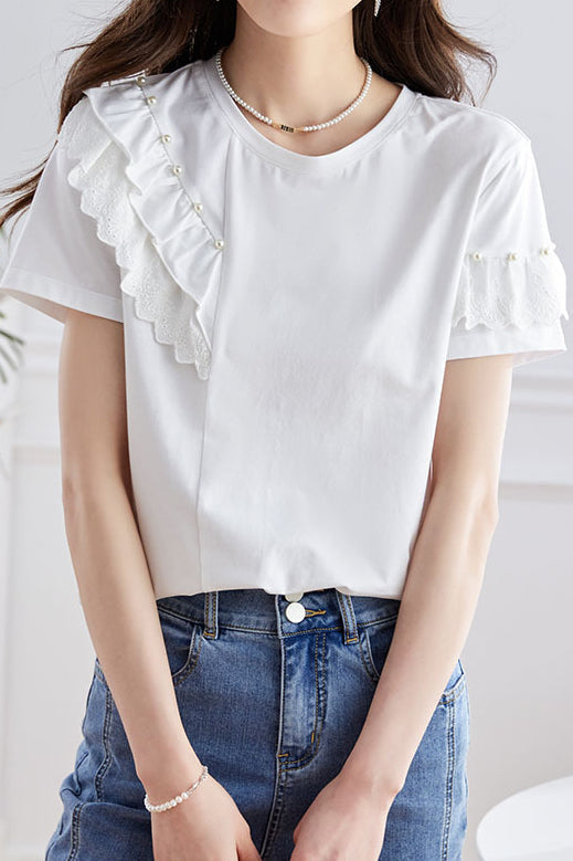 Elegant topp med volanger