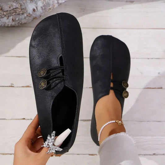 Eleganta ballerinas med dekorativa knappar